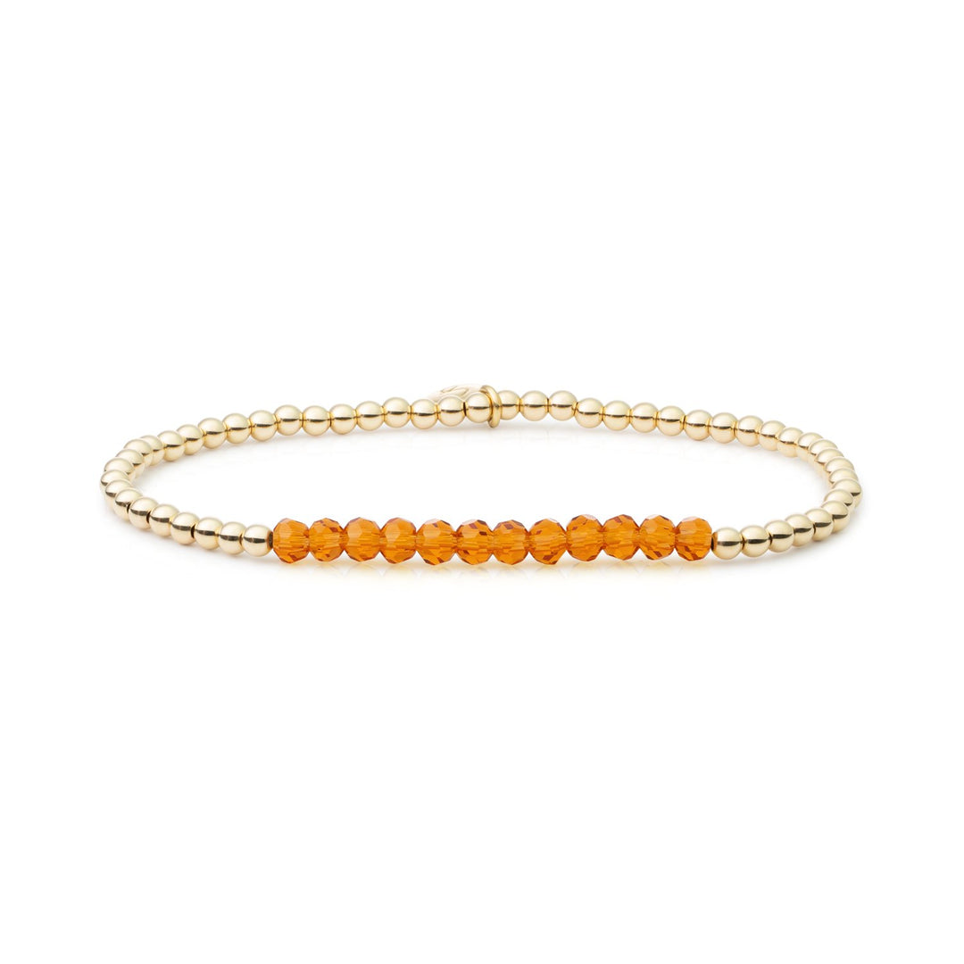 Oranjebruin met gouden beads universe armband #kleur_goud