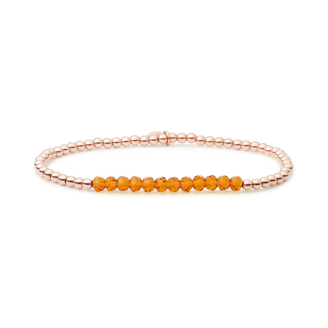 Sparkling Jewels universe armband oranjebruin met rosegoud #kleur_rosegoud