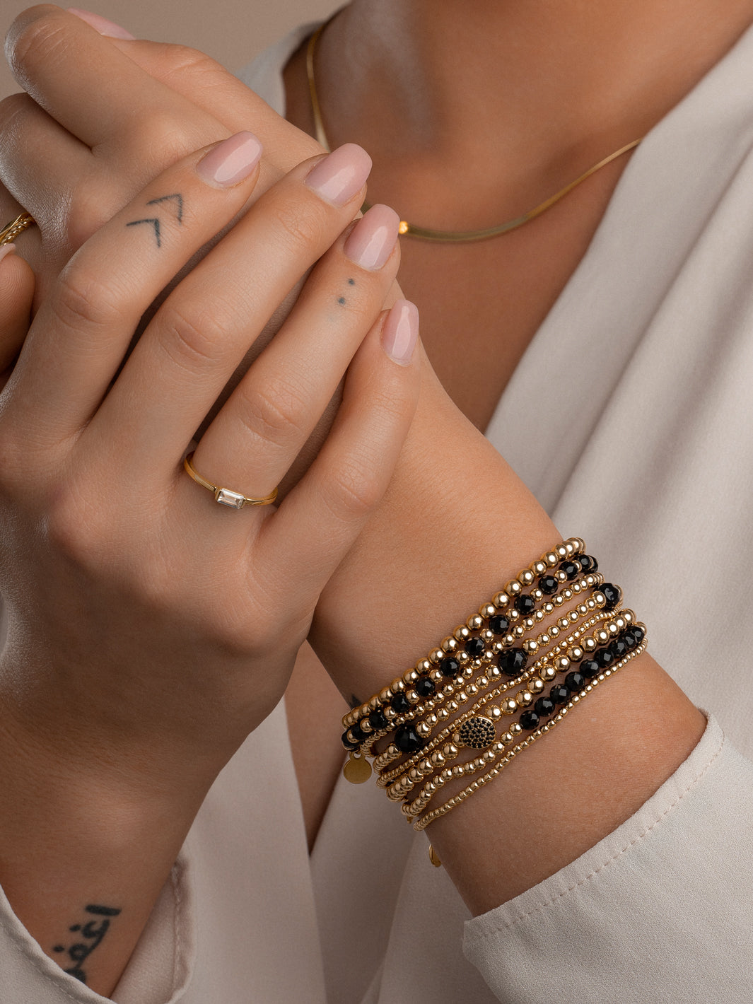 zwarte edelsteen armband met gold plating 