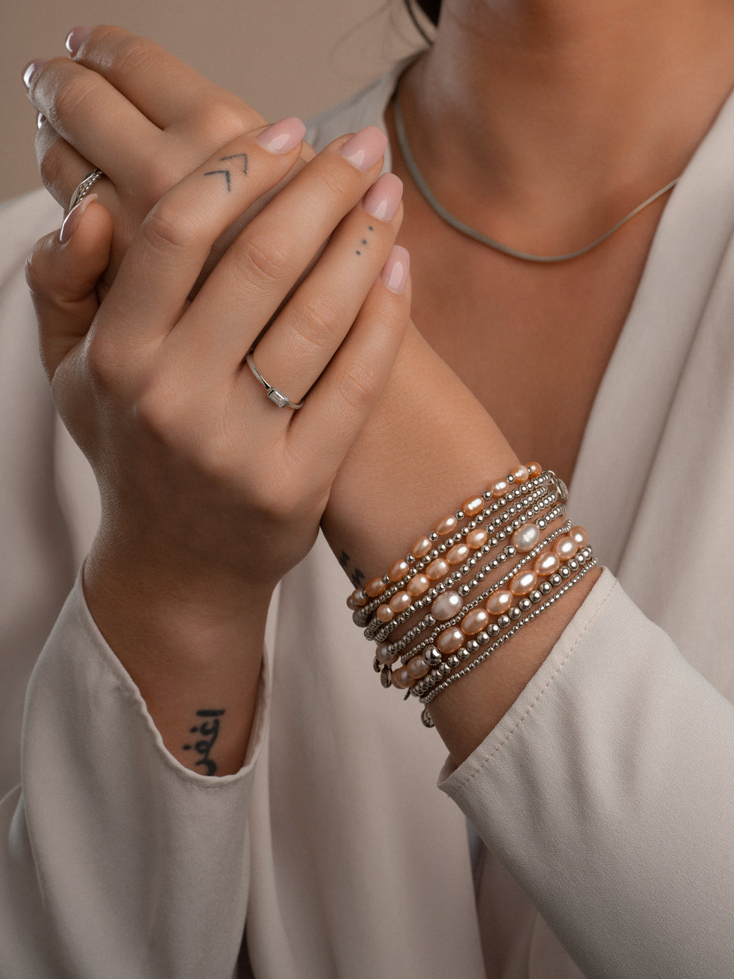 Armband om mee te zwemmen van Sparkling Jewels met zilveren kralen en parel #kleur_zilver